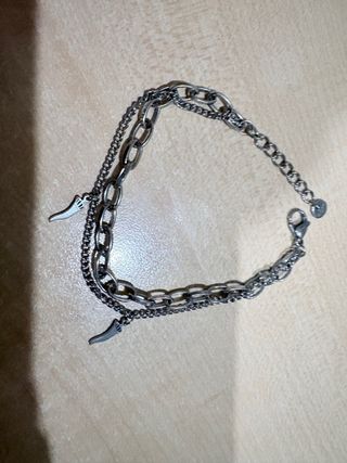 Braccialetto acciaio con cornetti portafortuna