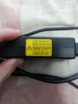 Cargador de corriente con cable