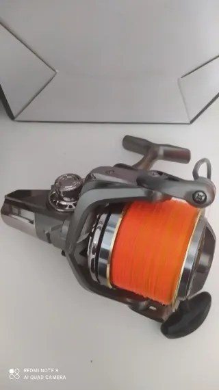 Pareja carretes surfcasting