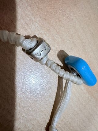 Braccialetto AUA bianco con occhio blu argento