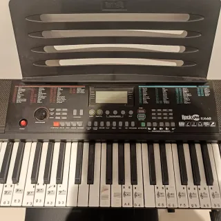 Teclado musical con soporte y banqueta
