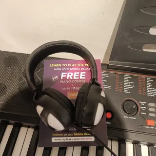 Teclado musical con soporte y banqueta