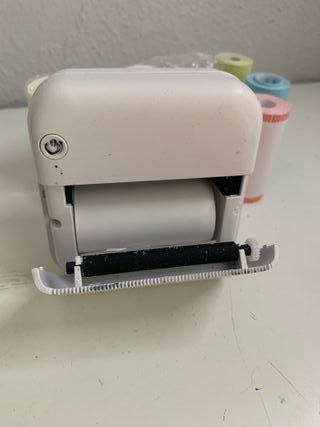 Mini impresora  que funciona sin tinta + rollos
