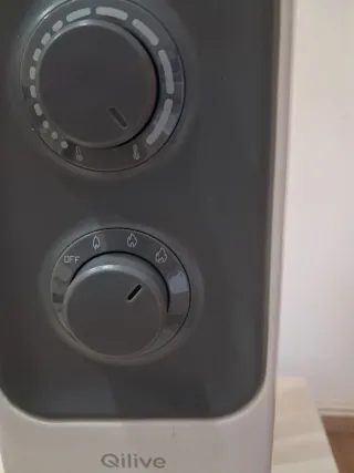 Radiador eléctrico blanco.Marca Qlive