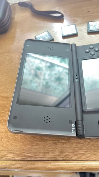 Nintendo DSi XL Negra + 3 Juegos