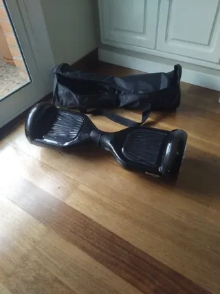 Patin electrico negro con bolsa