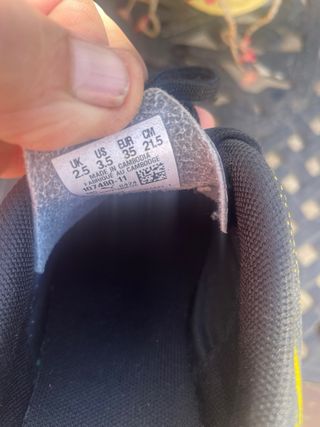 Botas de fútbol Puma niños negras y amarillas