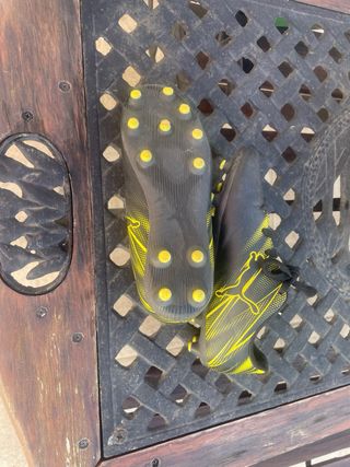 Botas de fútbol Puma niños negras y amarillas