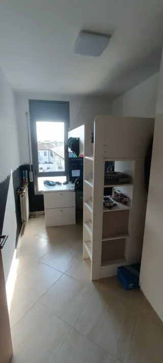 Habitación juvenil cama alta