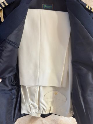 Traje comunión niño azul con detalles dorados