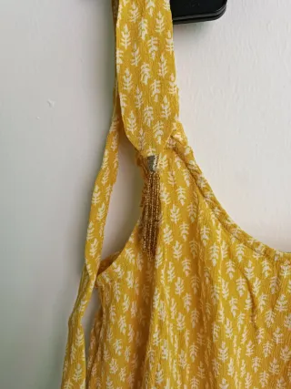 Mono Tintoretto amarillo estampado. Talla pequeño