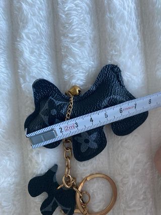 Charm perro con borla y llavero