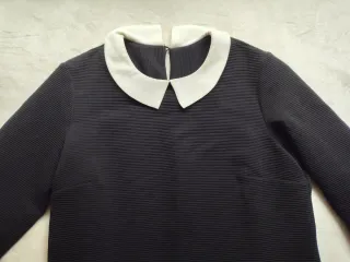 Vestido negro con cuello blanco