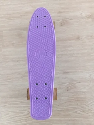 Monopatín morado para principiantes