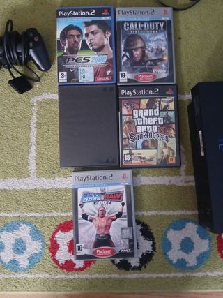PS2 con 2 mandos y 6 juegos
