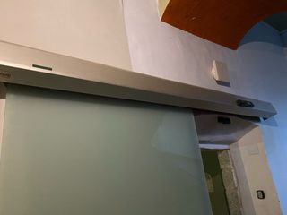 Puerta corredera de cristal