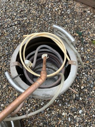 Alambique casero de cobre y acero