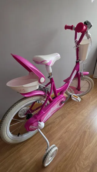 Bicicleta infantil rosa  14" con ruedines