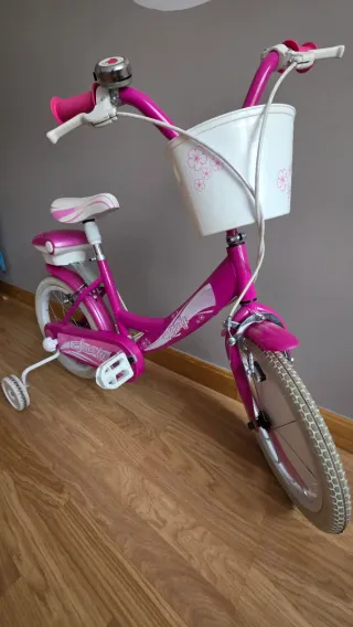 Bicicleta infantil rosa  14" con ruedines
