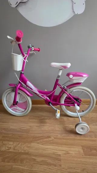 Bicicleta infantil rosa  14" con ruedines