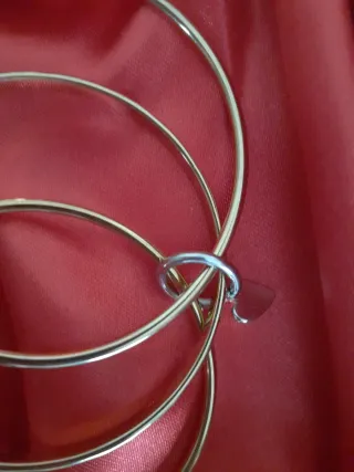 Pulseras doradas de acero con charm de corazón