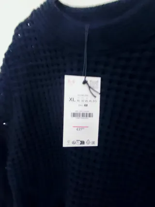 Jersey de punto con flecos