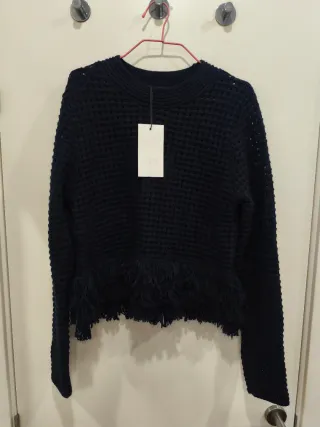 Jersey de punto con flecos