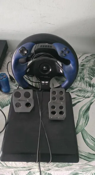 PlayStation 2 con accesorios (* LEER *)