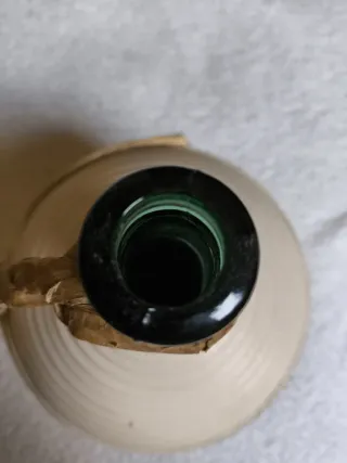 GARRAFON DE PAJA CON DAMAJUANA DE VIDRIO INTERIOR.