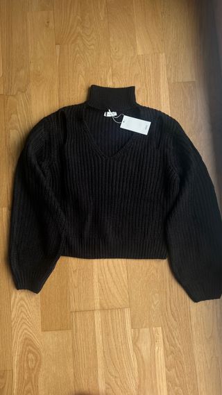 Jersey negro con hombros descubiertos “Mango”