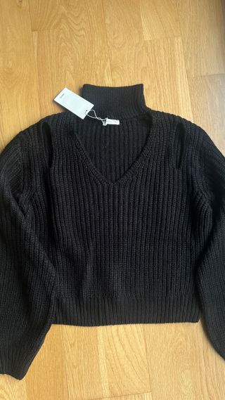 Jersey negro con hombros descubiertos “Mango”