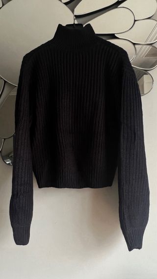 Jersey negro con hombros descubiertos “Mango”