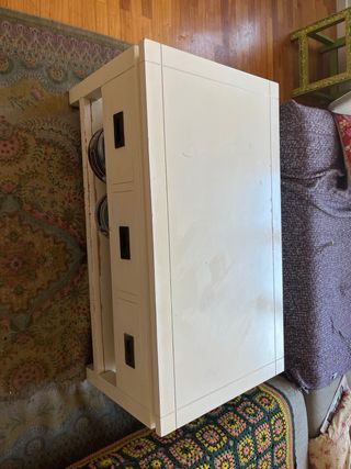 Mesa centro elevable.