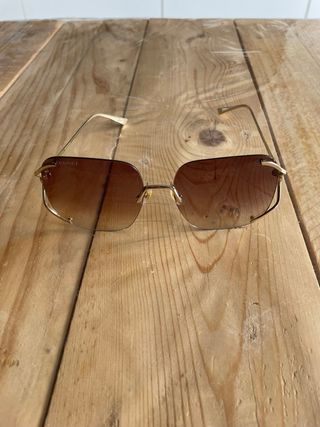 Gafas de sol Gucci doradas y rosas