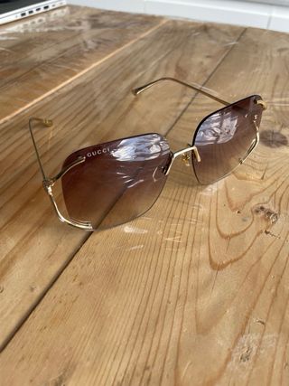 Gafas de sol Gucci doradas y rosas