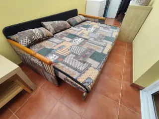 Sofá cama tela y madera