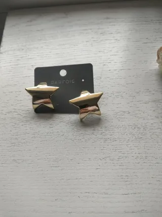 Pendientes estrella dorados Parfois.