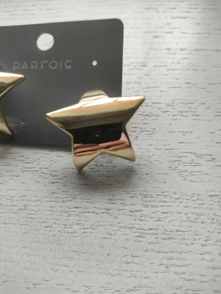 Pendientes estrella dorados Parfois.