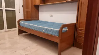 Dormitorio completo de madera