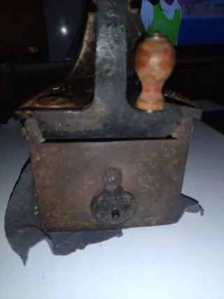 Plancha antigua de carbón N°7