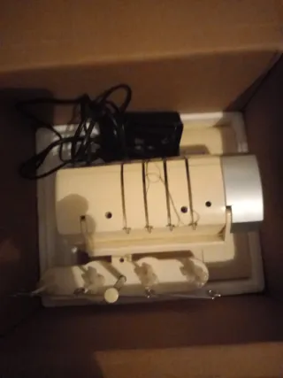 Máquina Overlock Singer