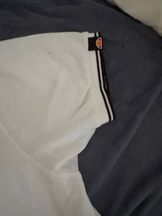 Polo Ellesse blanco con rayas