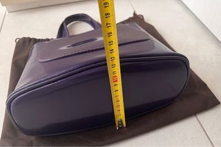 Borsetta Coccinelle viola prugna in pelle lucida