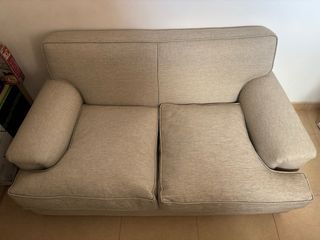Sofá de tela beige retapizado