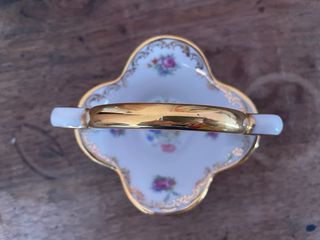 Cestino decorativo in ceramica con manico dorato