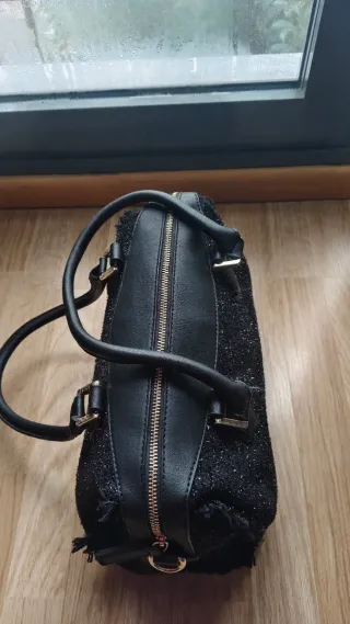 Bolso negro mujer con flecos
