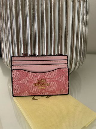 Porta cartões Coach rosa e dourado