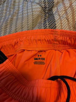 Pantaloncini sportivi Under Armour arancioni
