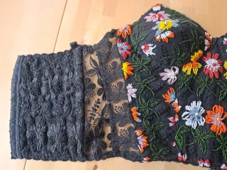 Corpiño y falda ee volantes