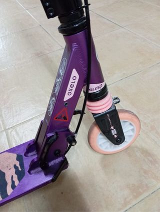 Patinete Oxelo rosa y morado